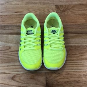 Yellow Nike free runs
